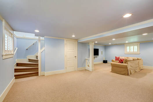 Basement newly repainted with a powder blue color. The work was done by Peintre Sherbrooke.